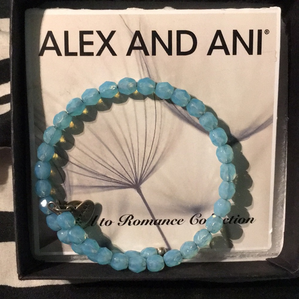 A blue Alex and Ani bracelet. - Picture 1 of 4